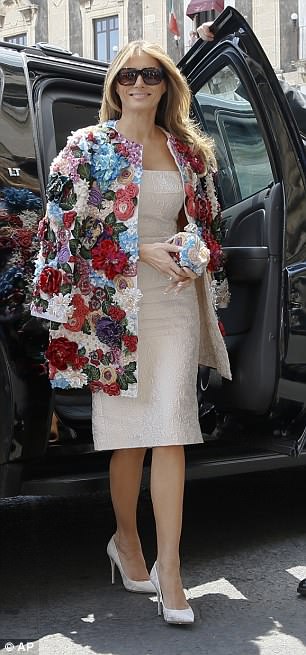 Melania wore an embellished $51,500 coat by Dolce & Gabanna as she arrived at Sicily