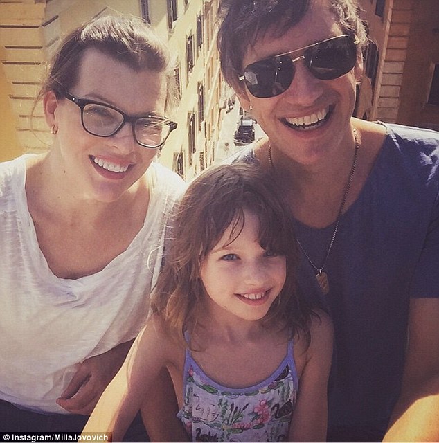 Happy families: Milla took time out sight-seeing to post a selfie with Paul and Ever